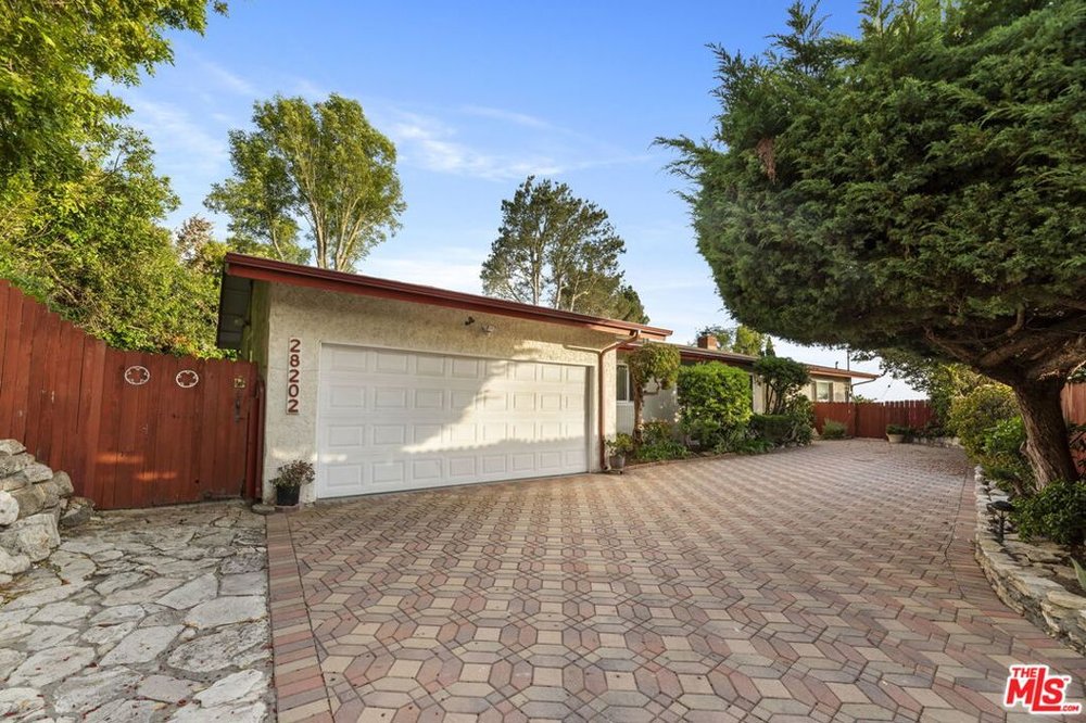 Front elevation of 28202 Ambergate Drive, Rancho Palos Verdes, a home sold by Riley Eastman