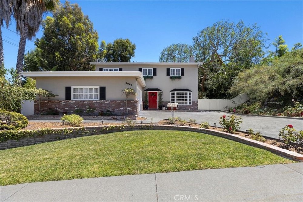 Front elevation of 2062 Redondela Drive, Rancho Palos Verdes, a home sold by Riley Eastman